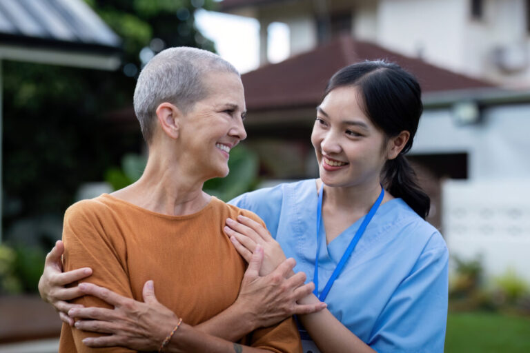 Healthcare, elderly woman with nurse or caregiver in home