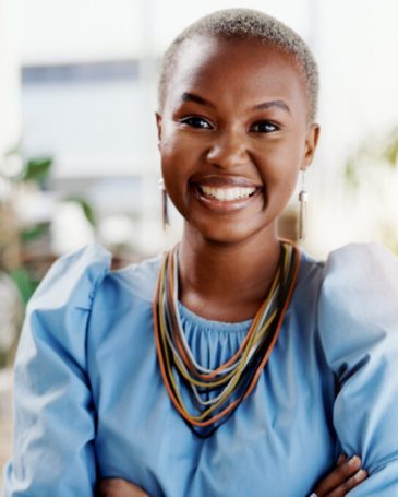 Happy, crossed arms and portrait of black woman in office with confidence for creative career. About us, professional and African fashion designer with pride for job opportunity or growth at agency.